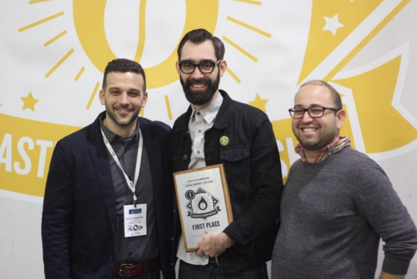 Querio, center, with Noah Namaowicz and Piero Cristiani of Cafe Imports. Photo credit Daily Coffee News.