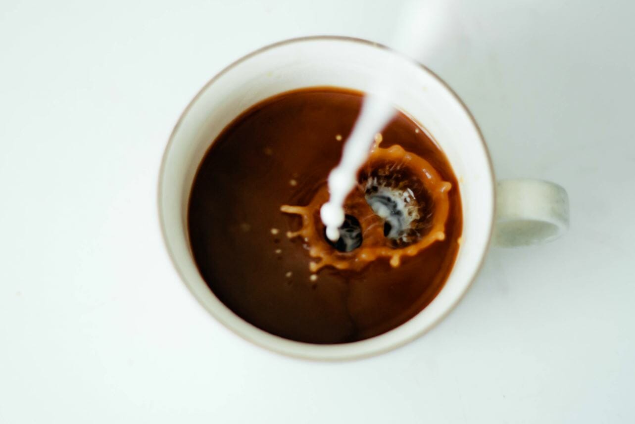 https://blog.mistobox.com/wp-content/uploads/2020/09/milk-in-coffee.jpg